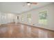 Bright living room featuring gleaming hardwood floors, neutral walls, and multiple windows at 2350 Maxine Se Dr, Marietta, GA 30067