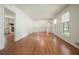 Large living space with hardwood floors, white walls, and abundant natural light at 2350 Maxine Se Dr, Marietta, GA 30067