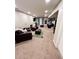 Basement living room with TV, comfortable seating, and Penn State decor at 3701 Shallowford Rd, Marietta, GA 30062