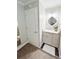 Cozy bathroom featuring a vanity with granite countertop and an decorative mirror at 3701 Shallowford Rd, Marietta, GA 30062