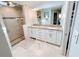This bathroom boasts a spacious shower and double vanity with granite countertops at 3701 Shallowford Rd, Marietta, GA 30062