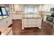 Modern kitchen with granite countertops, stainless steel appliances, and custom white cabinetry at 3701 Shallowford Rd, Marietta, GA 30062