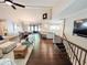 Open-concept living and dining areas seamlessly flow into the kitchen, perfect for modern living at 3701 Shallowford Rd, Marietta, GA 30062