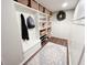 Mudroom boasts built-in shelving, seating and coat hooks at 3701 Shallowford Rd, Marietta, GA 30062