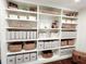 Built-in shelving offering ample storage space for books, decorative items, and storage boxes at 3701 Shallowford Rd, Marietta, GA 30062