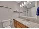 Bright bathroom featuring a large mirror, granite vanity, and a shower-tub combination with white subway tile at 3812 Stonewall Nw Dr, Kennesaw, GA 30152