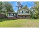 Charming two-story home featuring a well-maintained lawn and brick accents at 3812 Stonewall Nw Dr, Kennesaw, GA 30152
