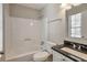 Bathroom featuring tub, toilet and marble top sink at 5379 Winslow Xing, Lithonia, GA 30038