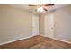 Bedroom features neutral walls, carpet, and two closets at 5379 Winslow Xing, Lithonia, GA 30038