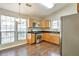 Eat in Kitchen with hardwood floors, stainless appliances and lots of light at 5379 Winslow Xing, Lithonia, GA 30038
