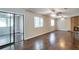 Spacious living room features hardwood floors, brick fireplace, and ceiling fans at 5379 Winslow Xing, Lithonia, GA 30038