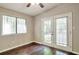 Bright sunroom with hardwood floors, large windows, and natural light at 5379 Winslow Xing, Lithonia, GA 30038