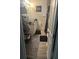 Tight bathroom layout with a rug and storage at 713 Dove Tree Ln, Social Circle, GA 30025