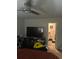 Spacious bedroom with a view of a bathroom, a ceiling fan, and carpet flooring at 713 Dove Tree Ln, Social Circle, GA 30025