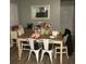 Cozy dining room with warm lighting and comfortable seating at 713 Dove Tree Ln, Social Circle, GA 30025