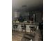 Kitchen featuring a breakfast bar and stainless steel refrigerator at 713 Dove Tree Ln, Social Circle, GA 30025