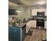 Well-equipped kitchen featuring stainless steel appliances and ample counter space at 713 Dove Tree Ln, Social Circle, GA 30025