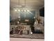 Comfortable living room with modern light fixture and open design at 713 Dove Tree Ln, Social Circle, GA 30025