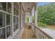 Charming balcony offering a relaxing outdoor space with views of the surrounding greenery at 963 Forrest St, Roswell, GA 30075