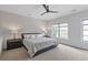 Spacious bedroom with neutral tones, large windows, and comfortable furnishings at 963 Forrest St, Roswell, GA 30075