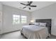 Bedroom has a comfy bed and lots of light at 963 Forrest St, Roswell, GA 30075