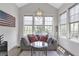 Comfortable sitting area features large windows, modern lighting and an American flag at 963 Forrest St, Roswell, GA 30075