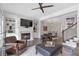 Inviting living room with fireplace, built-in shelving, and comfortable seating at 963 Forrest St, Roswell, GA 30075