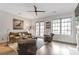 Comfortable living room with hardwood floors, fireplace, and natural light at 963 Forrest St, Roswell, GA 30075