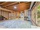 Partially finished basement area with recreation space and natural light provides potential for various uses at 4050 Arrow Head Trl, Cumming, GA 30041