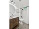 Stylish bathroom with shiplap walls, decorative tile floors, and a modern vanity at 4050 Arrow Head Trl, Cumming, GA 30041