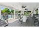 View of the covered outdoor bar area, perfect for entertaining next to the tennis court at 4050 Arrow Head Trl, Cumming, GA 30041