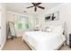 Bright bedroom features a large window, neutral decor, and comfortable furnishings at 79 Anniston Se Ave, Atlanta, GA 30317