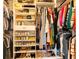 Organized walk-in closet offers ample storage space for clothes, shoes, and accessories at 79 Anniston Se Ave, Atlanta, GA 30317