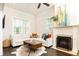 Cozy living room features a fireplace, modern decor, and comfortable seating at 79 Anniston Se Ave, Atlanta, GA 30317