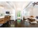 Open-concept kitchen and living room with hardwood floors and bright natural light at 79 Anniston Se Ave, Atlanta, GA 30317