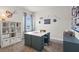 Bright craft room with custom worktable, storage, and natural light, perfect for hobbies at 1245 Elowen Dr, Austell, GA 30168