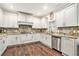 Beautiful kitchen featuring granite countertops, stainless steel appliances, and custom cabinets at 2798 Glenlocke Nw Cir, Atlanta, GA 30318