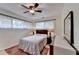 Charming bedroom with a cozy bed and ample natural light from the window at 3081 Anthony Dr, Decatur, GA 30033