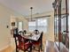 Inviting dining room with hardwood floors and direct access to the kitchen with stainless appliances at 3081 Anthony Dr, Decatur, GA 30033