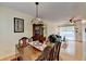 Inviting dining room with hardwood floors, decorative light fixture, and classic china cabinet at 3081 Anthony Dr, Decatur, GA 30033