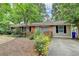 Charming single-story home with brick accents, lovely front yard, and driveway at 3081 Anthony Dr, Decatur, GA 30033