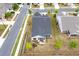 Rear aerial view of a well-maintained home showcasing its backyard and neighborhood at 463 Marston Pass, Acworth, GA 30102