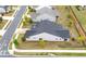 Rear aerial view of a well-maintained home showcasing its backyard and neighborhood at 463 Marston Pass, Acworth, GA 30102