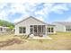 Well-kept backyard with a charming screened-in porch and comfortable seating area at 463 Marston Pass, Acworth, GA 30102