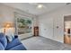 Spare bedroom featuring a closet, loveseat and a window with curtains at 463 Marston Pass, Acworth, GA 30102