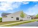 Side view of a home with vinyl siding and a well maintained lawn at 463 Marston Pass, Acworth, GA 30102