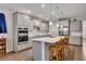 Stylish kitchen with modern appliances, a kitchen island, and pendant lighting at 463 Marston Pass, Acworth, GA 30102