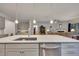 Kitchen island with granite countertop and stainless steel dishwasher at 463 Marston Pass, Acworth, GA 30102