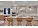 Bright and airy kitchen with a kitchen island, pendant lights, and modern appliances at 463 Marston Pass, Acworth, GA 30102