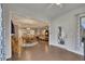 Bright living space with hardwood floors, ample natural light, and seamless connection to other living areas at 463 Marston Pass, Acworth, GA 30102